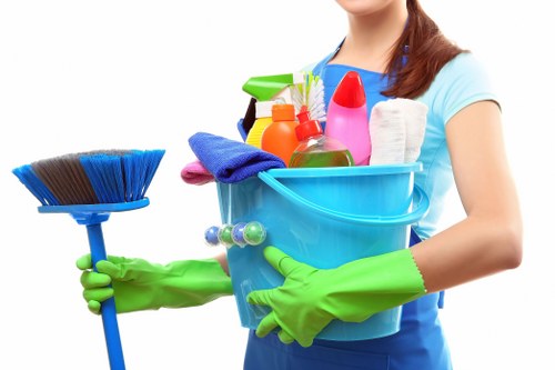 Cleaning staff using protective gear during carpet cleaning