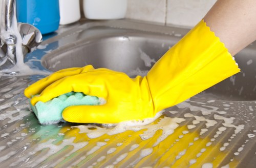 Deep kitchen cleaning during a Belsizepark move-out service